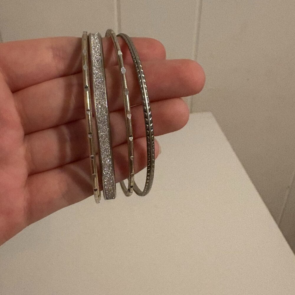 4 silver bracelets